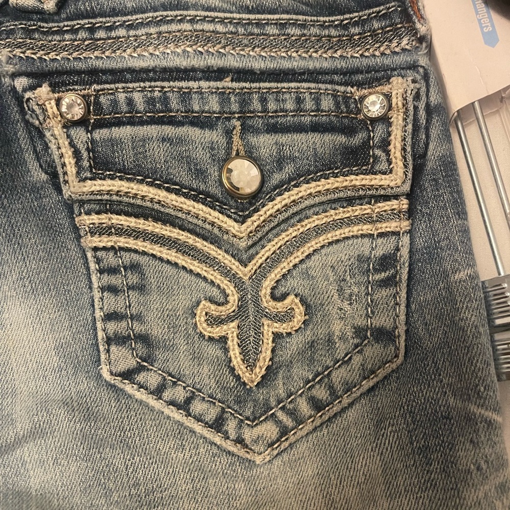 Rock revival light washed flare jeans